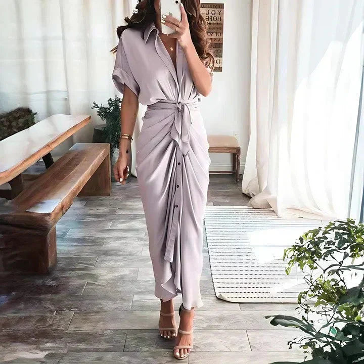 Luxurious women's ruched tie waist collared midi dress, embodying timeless style for various occasions.