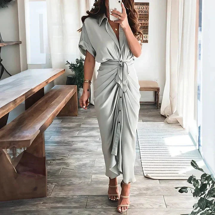 Stylish women's collared midi dress with ruched tie waist & button front, perfect for spring fashion.
