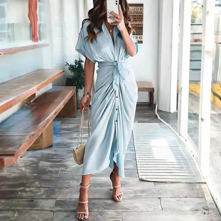 Fashionable women's collared v-neck midi dress, ruched tie waist detail, excellent for wedding guests.