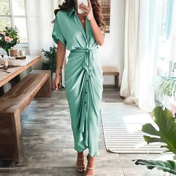 Women's elegant collared midi dress with ruched tie waist and flattering silhouette for any event.
