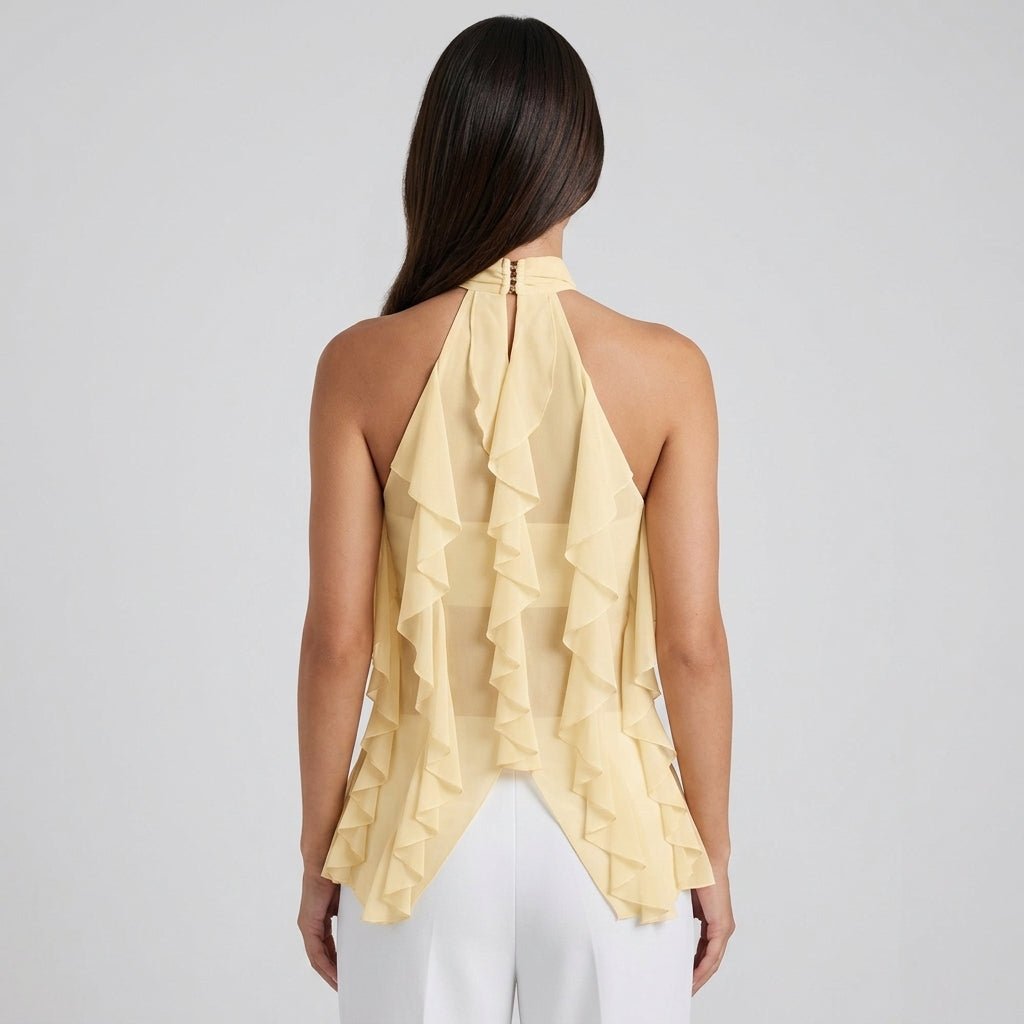Women's elegant yellow ruffle halter blouse, perfect for a chic and stylish evening look.