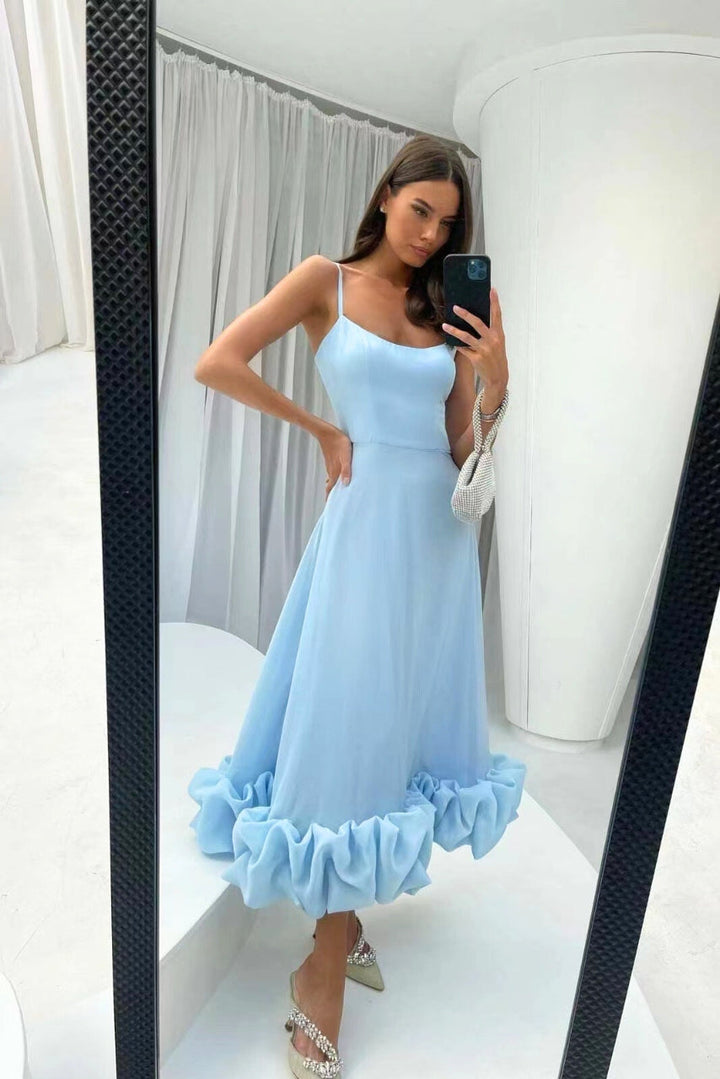 Chic women's ruffle hem maxi dress, perfect as a summer party or wedding guest dress.