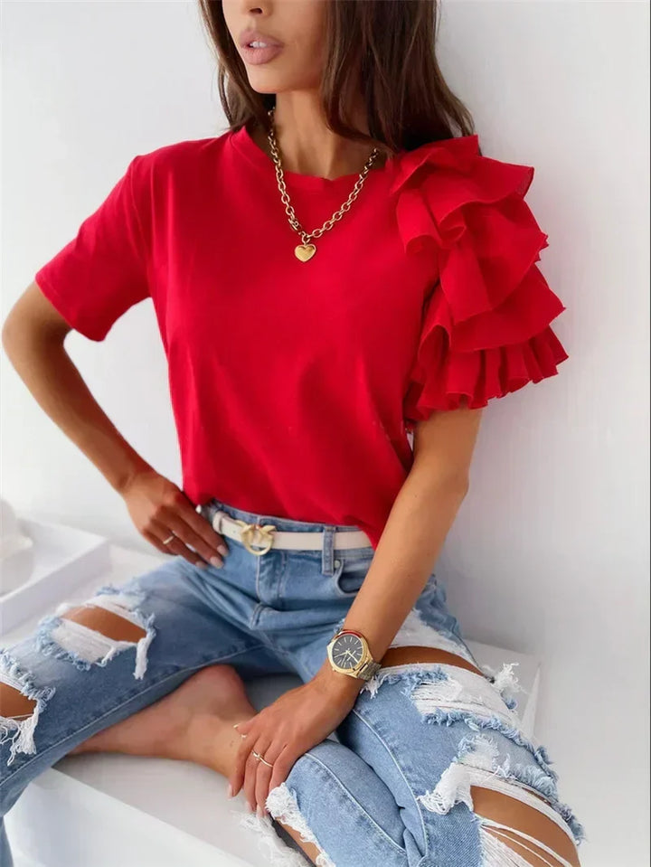 Elegant women's ruffle sleeve top in a chic red, perfect for spring/summer fashion. Versatile statement blouse.