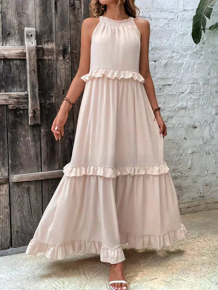 Feminine women's ruffled midi dress; a comfortable, flowy, and sleeveless option for summer.