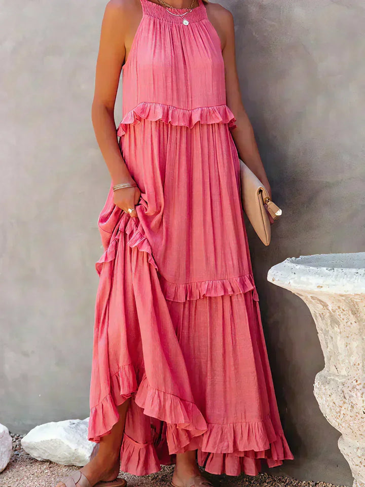 Effortlessly elegant women's flowy midi dress, sleeveless with playful ruffles for any event.