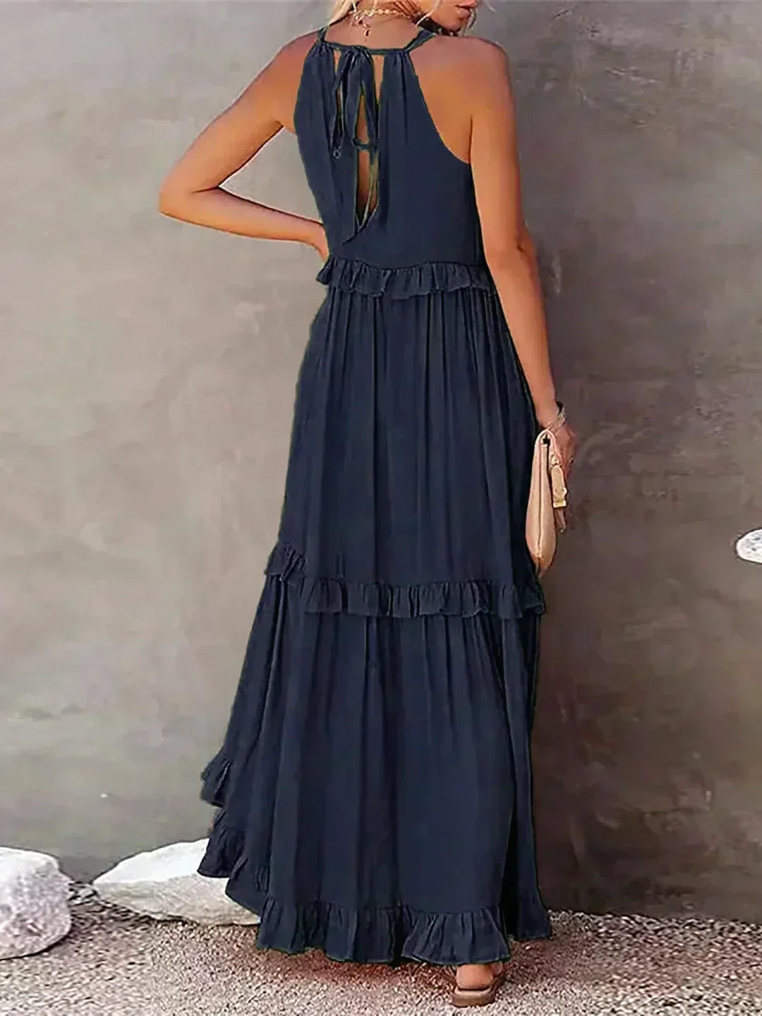 Classic women's sleeveless midi dress with a contemporary flowy fit and subtle ruffle detail.