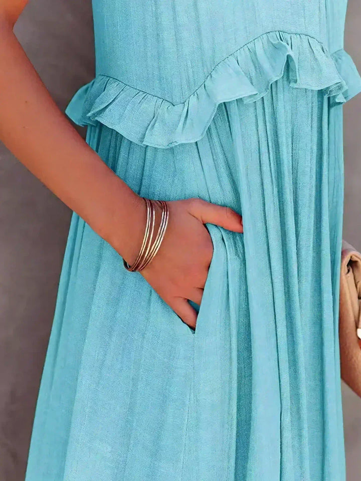 Graceful women's ruffled flowy sleeveless midi dress, perfect for garden parties or beach strolls.