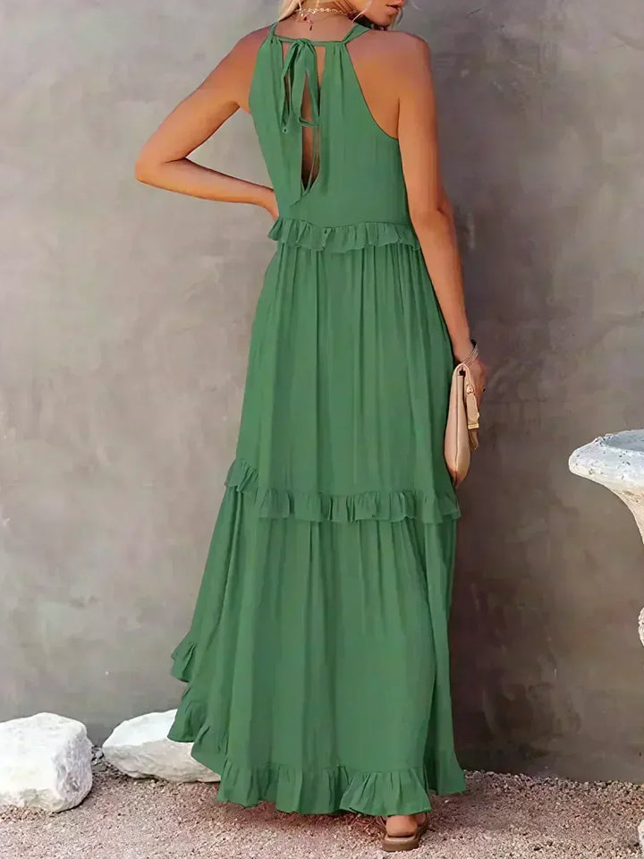 Modern women's sleeveless midi dress, offering a flattering flowy silhouette & stylish ruffles.