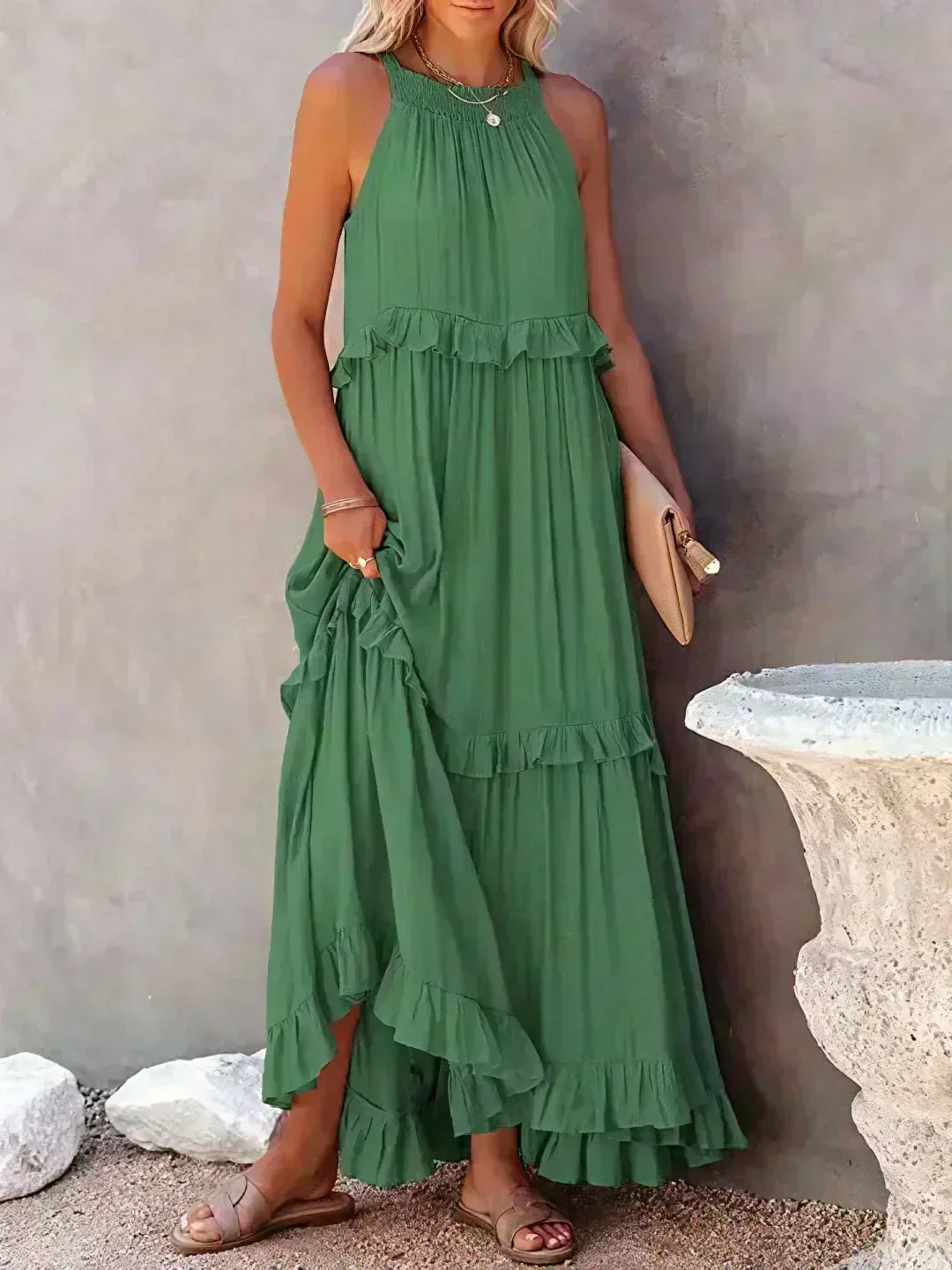 Party-ready women's sleeveless midi dress with a beautiful flowy skirt & delicate ruffles.
