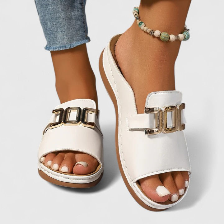 Sophisticated slip-on orthopedic sandals for women, providing superior arch support & comfort.