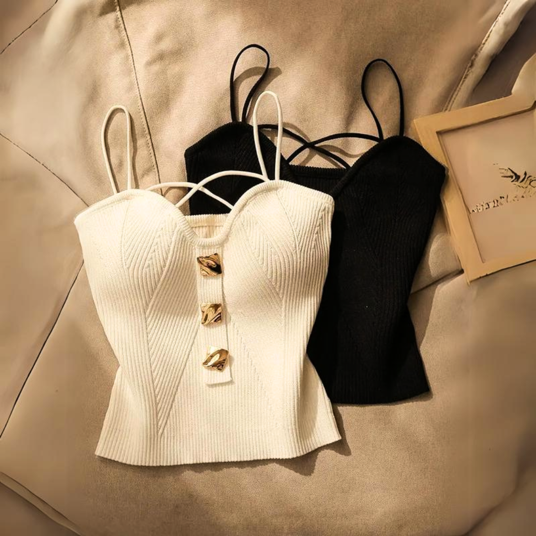 Black women's sculpted corset top with adjustable straps, elegant party wear featuring gold hardware.