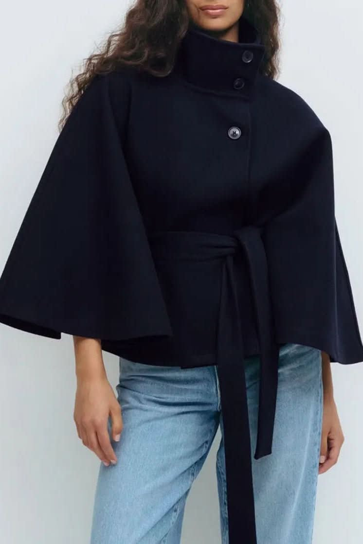 Stylish women's oversized self-tie cape, featuring an elegant draped fit for chic fashion outerwear.