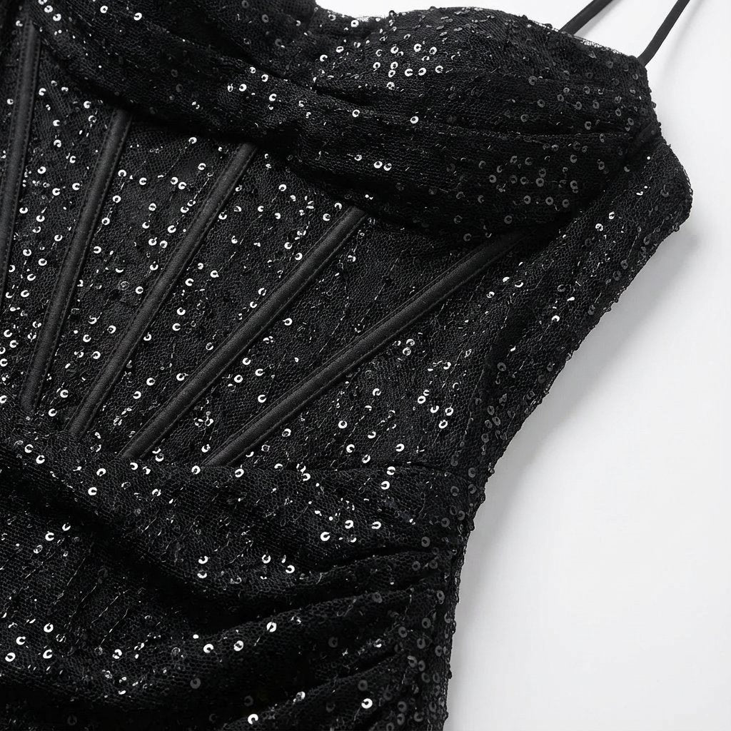 Shimmering women's sequin formal gown, a glamorous long dress with a sweetheart neckline.