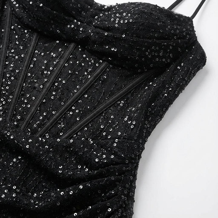 Shimmering women's sequin formal gown, a glamorous long dress with a sweetheart neckline.