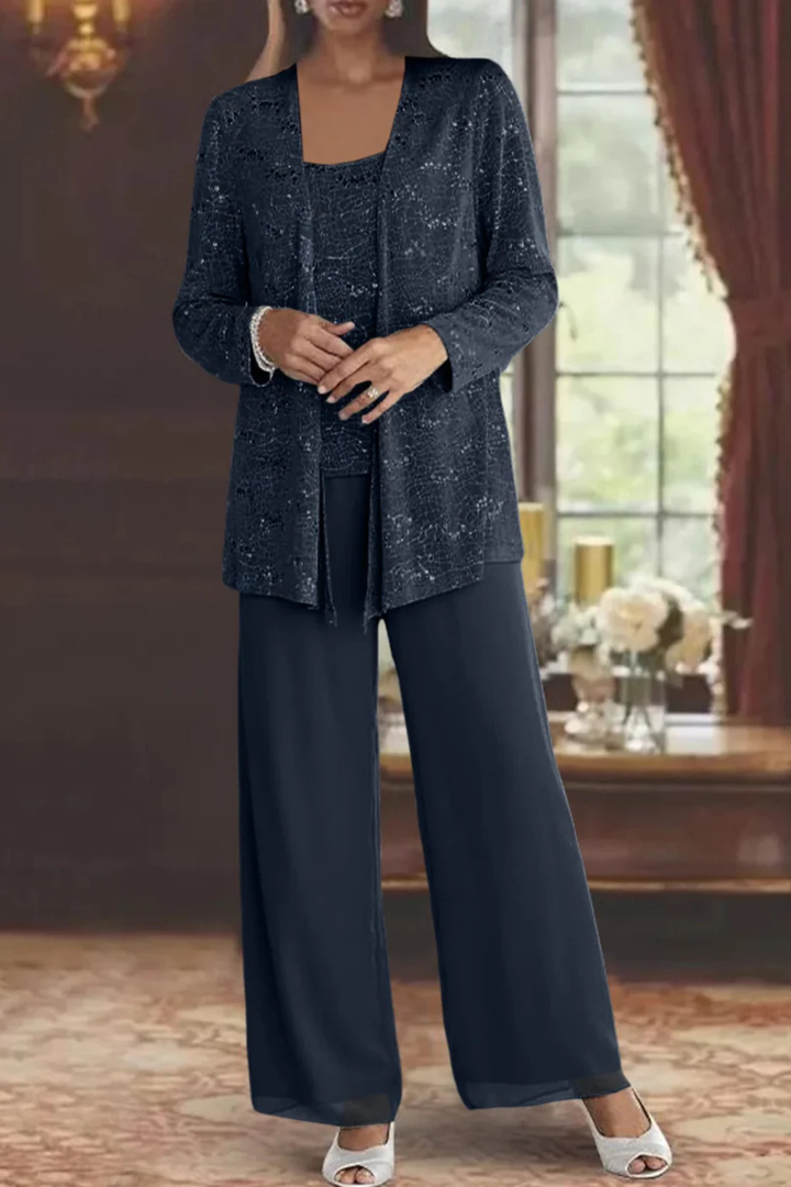 Women's sequin three-piece pant set laid flat, showcasing the wide-leg pants, top, and shimmering cardigan.