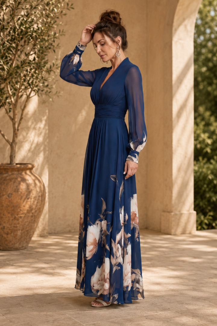 Chic women's pleated maxi dress with sheer sleeves, ideal for special occasions, parties, or sophisticated style.
