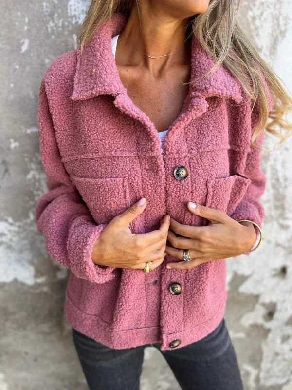 Stylish women's elegant lapel short jacket. Perfect fall/winter outerwear, offering comfort & a fashionable look.