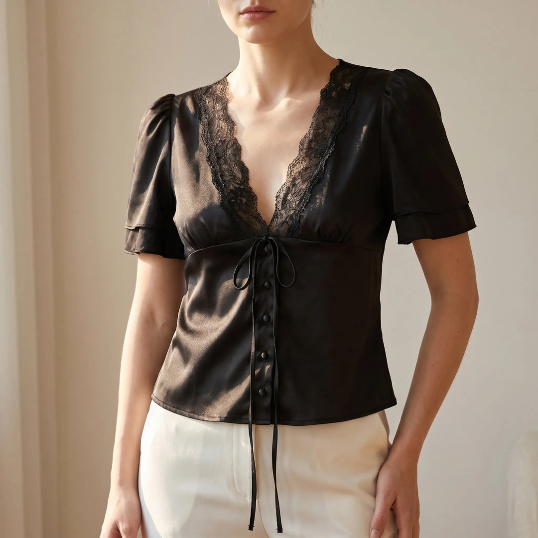 Elegant women's short sleeve blouse with delicate lace trim & V-neck, perfect for versatile day-to-night wear.