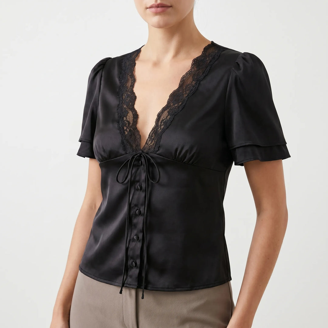 Versatile short sleeve women's blouse featuring elegant lace trim, a flattering V-neck, ideal for casual chic style.