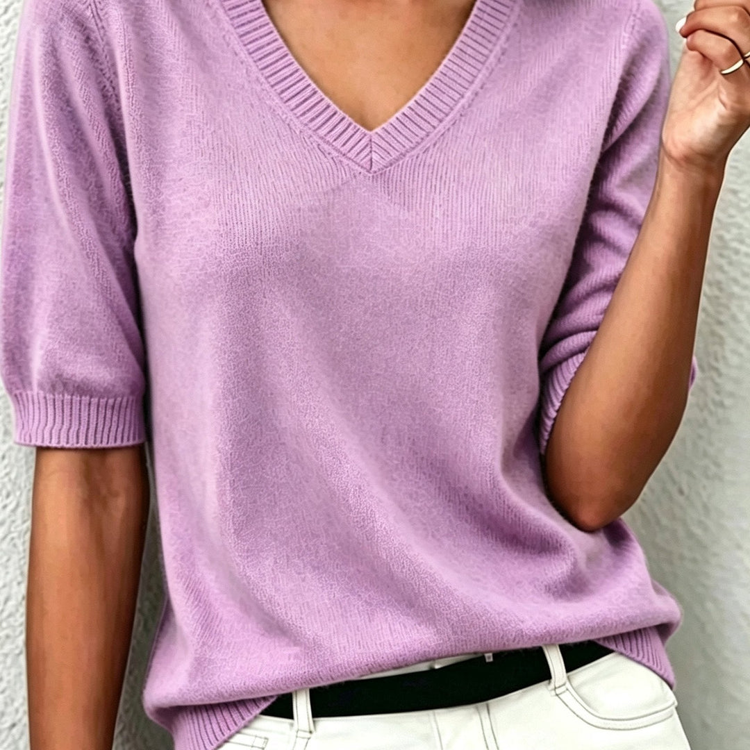 Women's V-neck short-sleeve sweater featuring a stylish ribbed collar for a sophisticated look.
