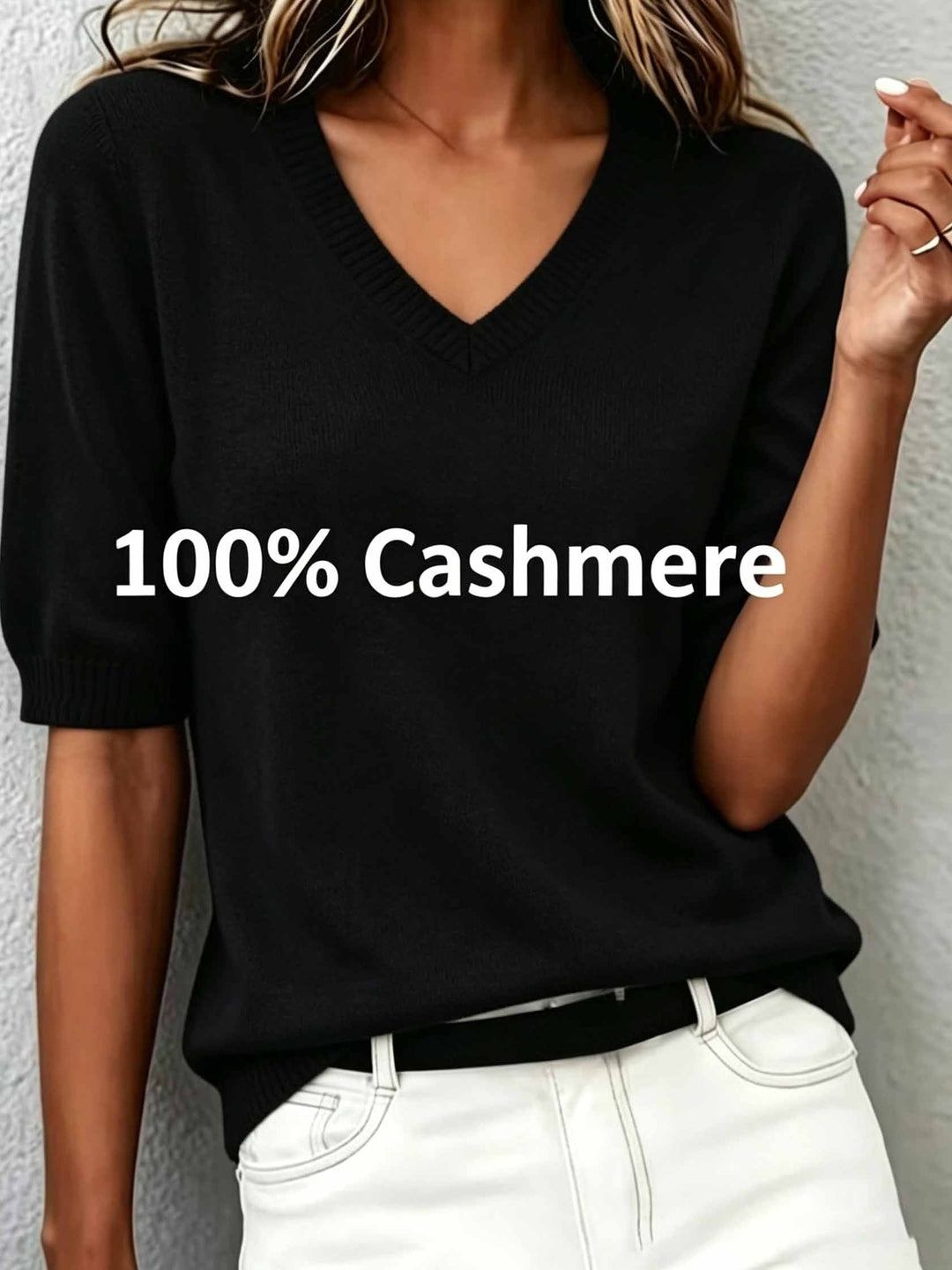 Transitional women's short-sleeve V-neck sweater with ribbed collar, great for changing seasons.