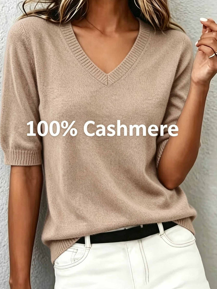 Chic women's short-sleeve V-neck sweater, an elegant and versatile top with a ribbed collar.