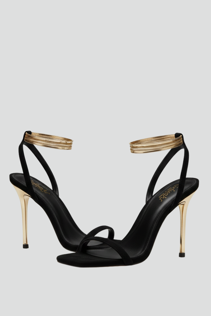 Elegant women's sleek ankle wrap heeled sandals with slim heel for stylish formal or party wear.