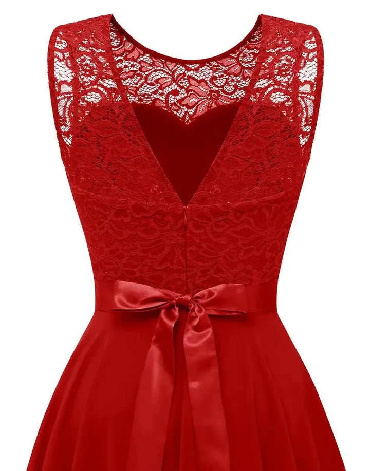 Sleeveless women's evening gown with an elegant asymmetrical high-low hem for formal events.