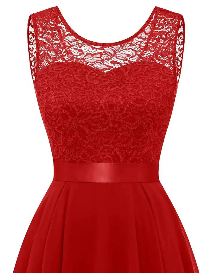 Fashionable women's party dress. Elegant sleeveless asymmetrical high-low design in a formal style.