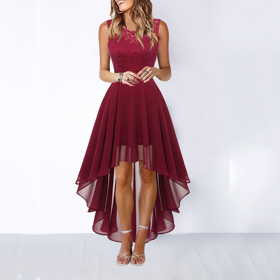 A graceful sleeveless high-low dress, an elegant formal gown designed for sophisticated women.