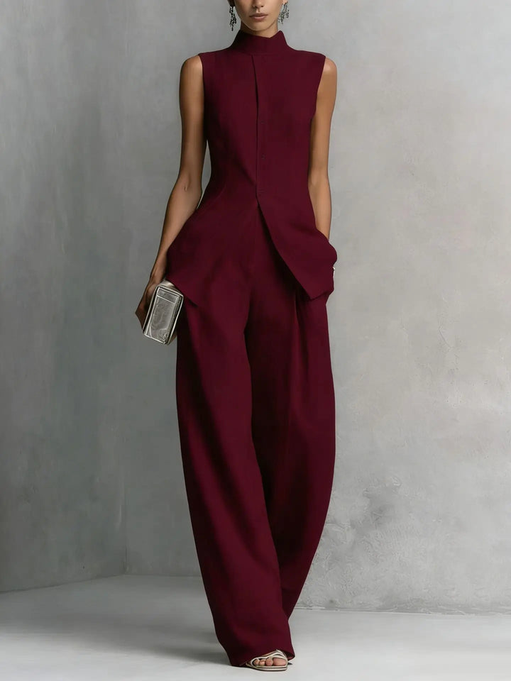 Modern women's wide leg jumpsuit with a high neck & sleeveless design, ideal for evening parties or formal attire.