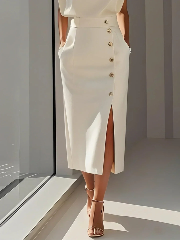 Formal women's sleeveless midi dress, tailored fit, featuring a classy slit & striking gold buttons.