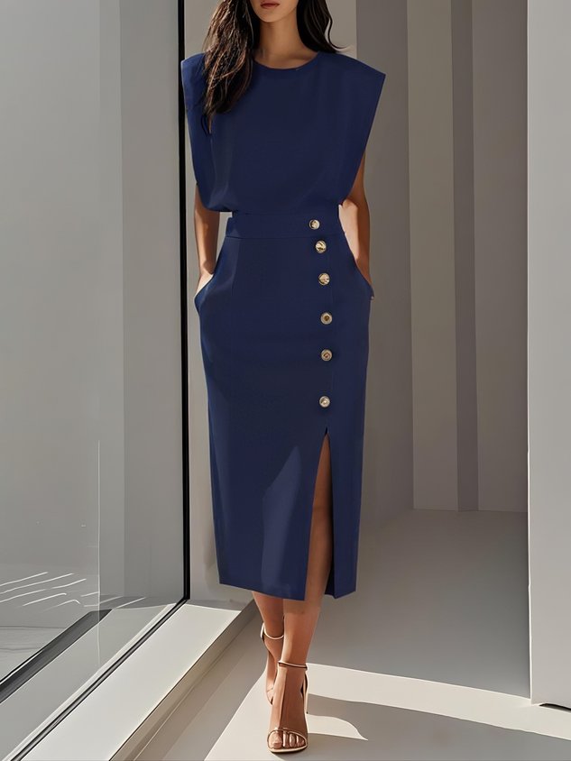 Elegant women's sleeveless midi dress, featuring a side slit & sparkling gold buttons.