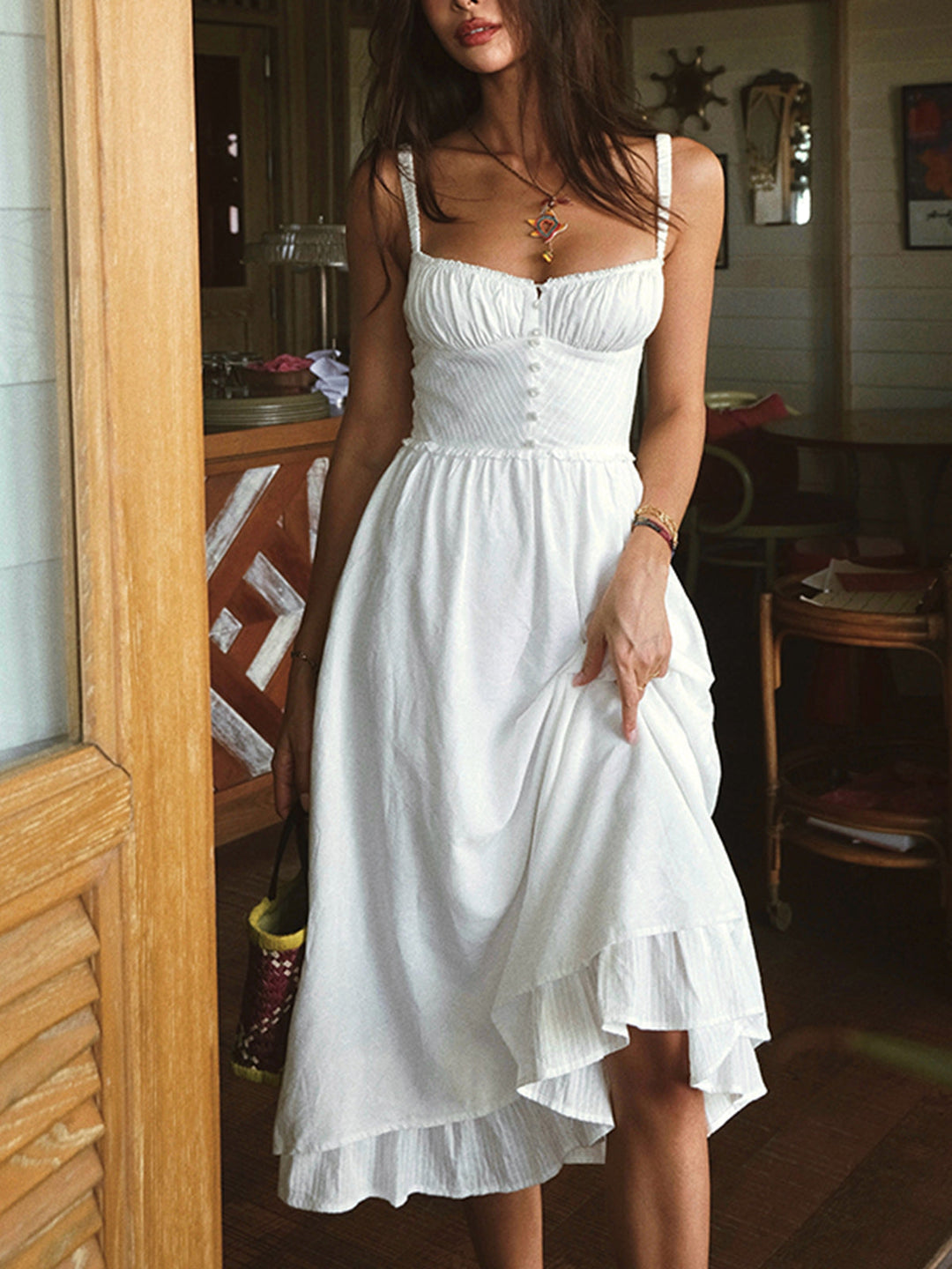 Pink women's elegant sleeveless midi dress. Ruffle hem adds chic detail, ideal for parties or spring wear.