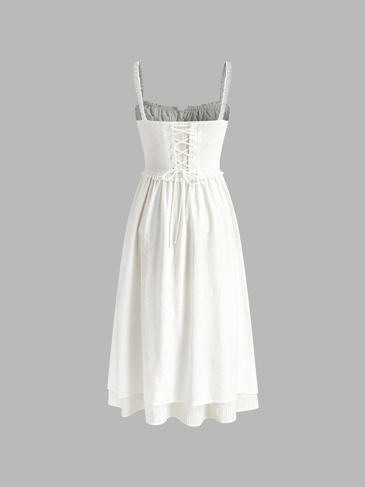 Women's solid color sleeveless midi dress. Elegant design with a beautiful ruffle hem, ideal for spring fashion.