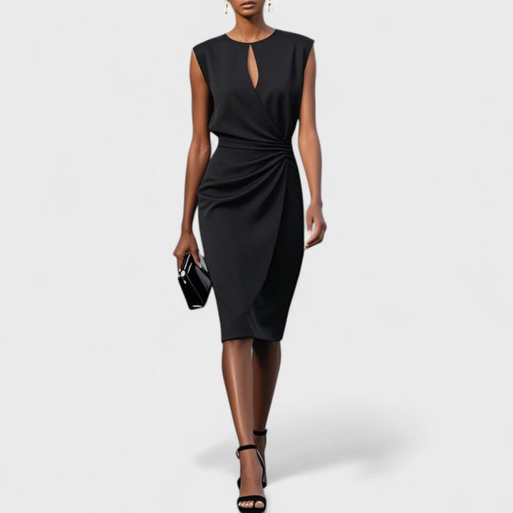 Formal women's midi dress featuring a sleeveless design, flattering cutout, and elegant pleated skirt.