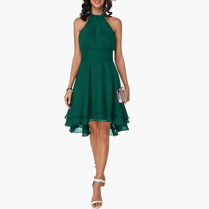 Comfortable women's sleeveless ruffle dress, elegant round neck, knee-length for stylish summer fashion.