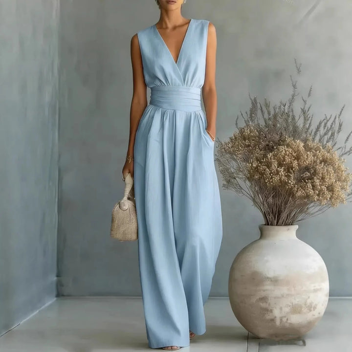 Elegant women's sleeveless V-neck wide-leg jumpsuit, perfect for summer evening wear & casual chic outfits.