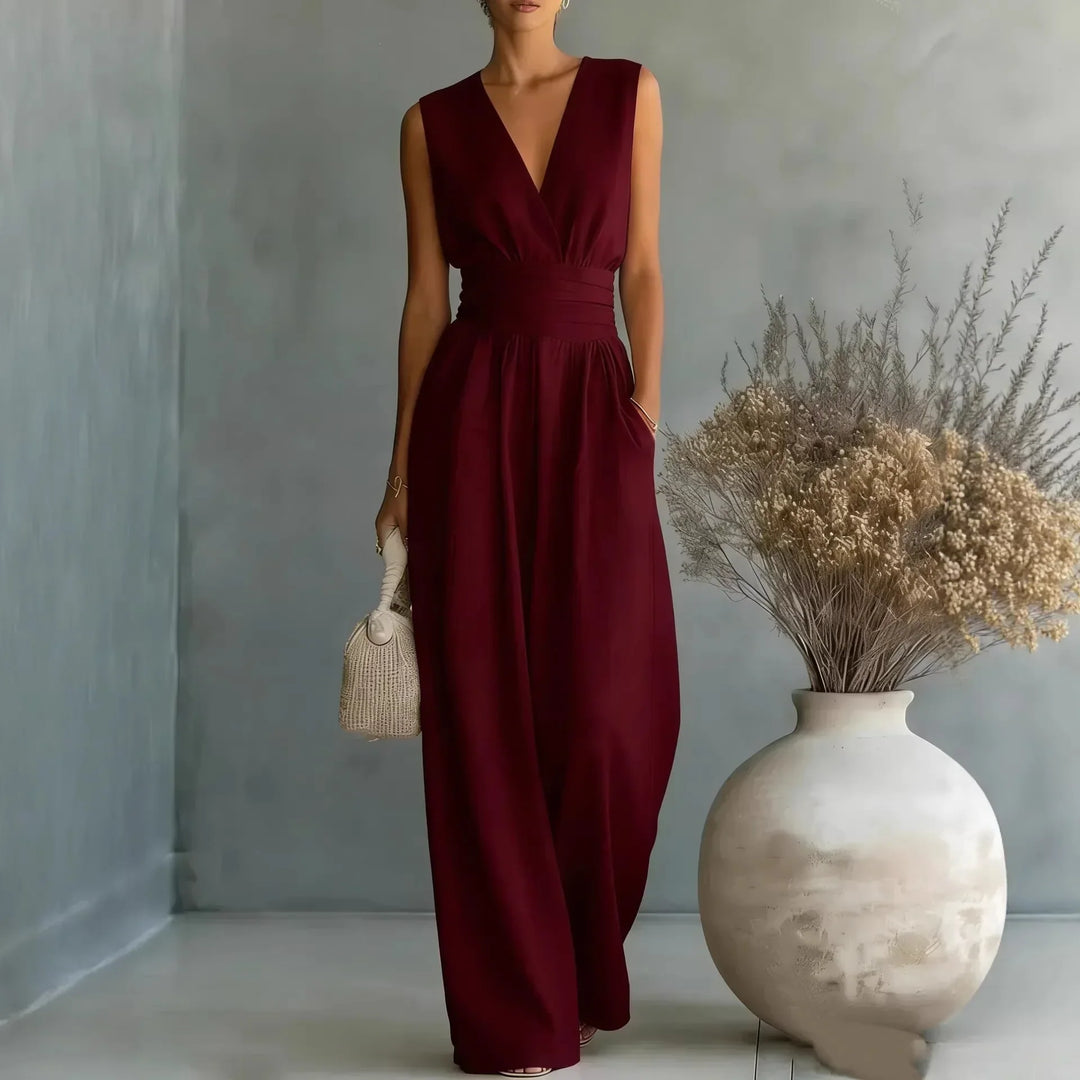 Stylish women's wide-leg jumpsuit with a sleeveless V-neck, comfortable & modern for summer fashion.