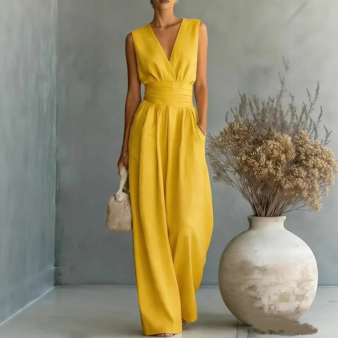 Modern women's one-piece sleeveless V-neck wide-leg jumpsuit for elegant evening wear or casual chic looks.