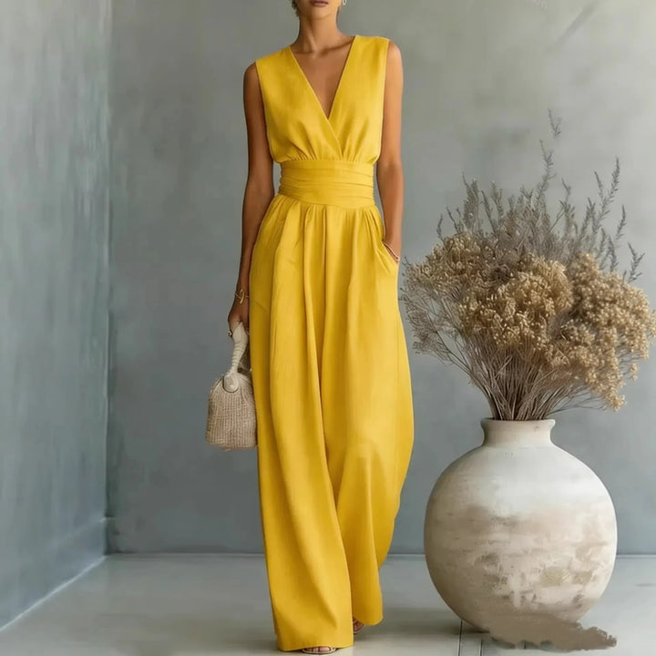 Modern women's one-piece sleeveless V-neck wide-leg jumpsuit for elegant evening wear or casual chic looks.