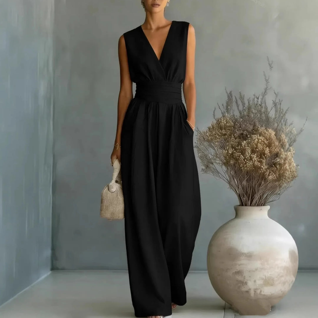 Chic women's sleeveless V-neck wide-leg jumpsuit, an elegant summer fashion outfit, comfortable & stylish.