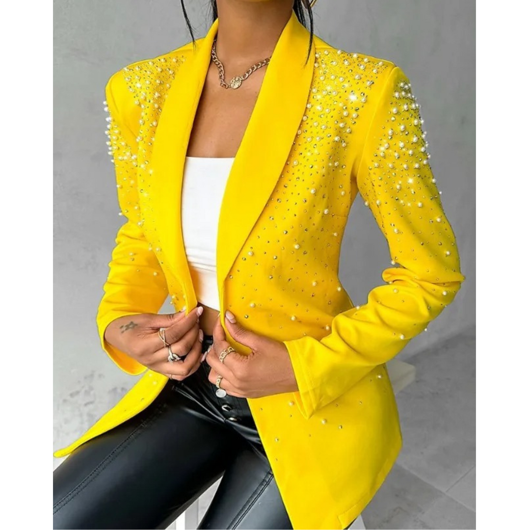 Elegant women's slim-fit blazer with delicate pearl details, perfect for business or chic casual wear.
