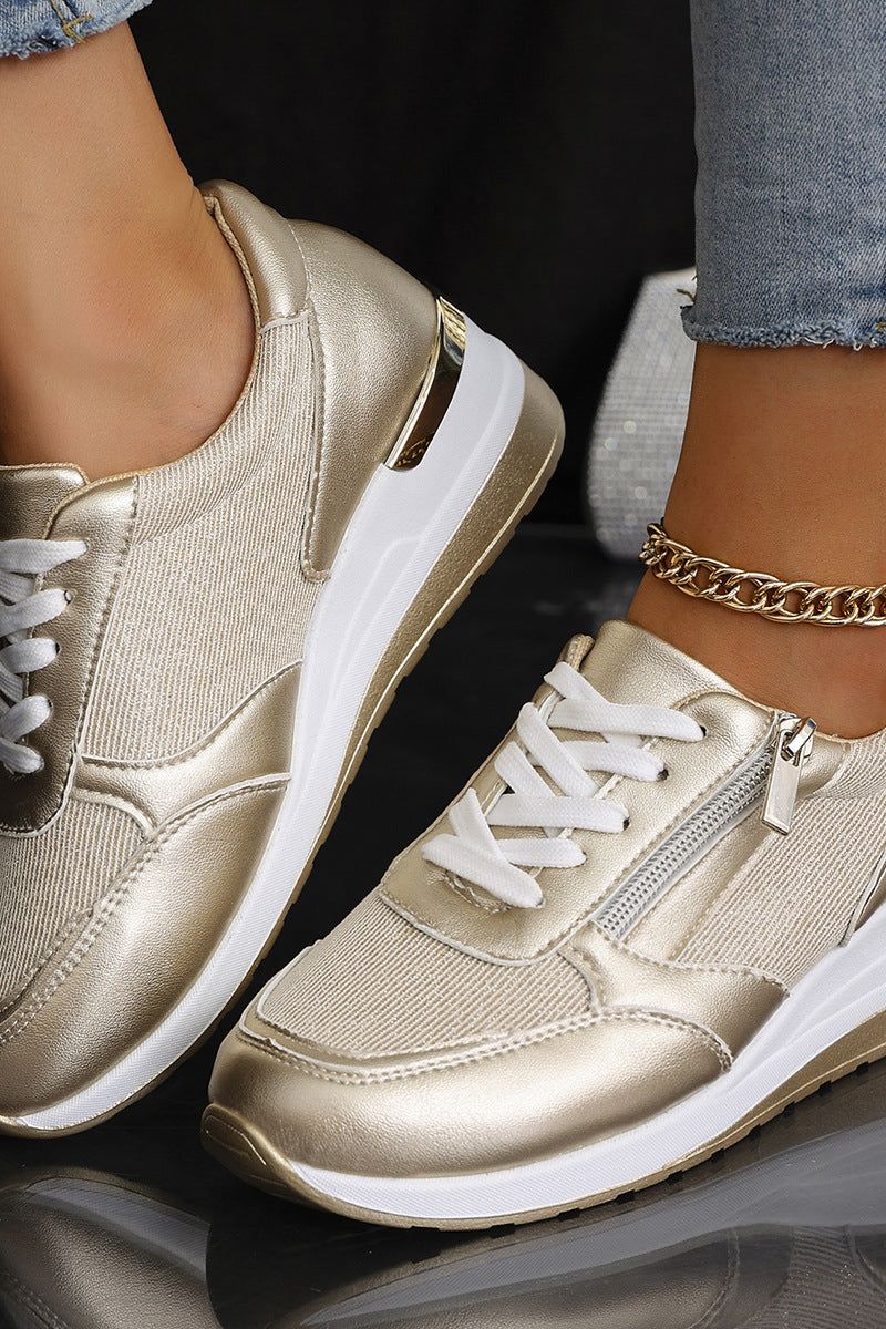 Chic gold women's slip-on shoes, perfect for travel or elevating your casual and dressy outfits.