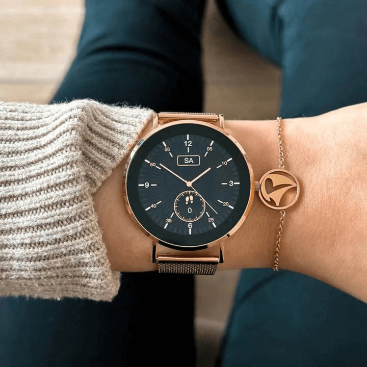 Women's smart fitness tracker, monitoring heart rate, steps & sleep with a sleek, modern look.