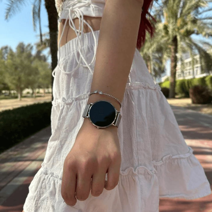 Elegant women's activity tracker smartwatch, sleek design for daily wear, tracking health and fitness.