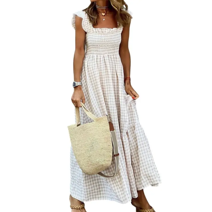 Elegant women's smocked tiered maxi dress, perfect for summer. Flowy, comfortable, and stylish long dress.