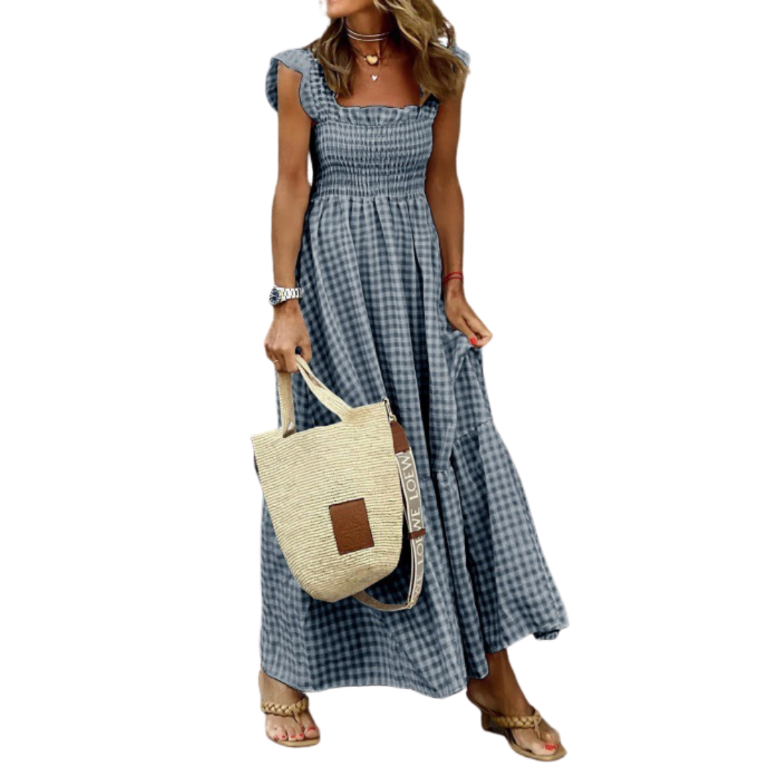 Comfortable smocked tiered maxi dress for women. Ideal for casual wear, spring & summer. Features pockets.