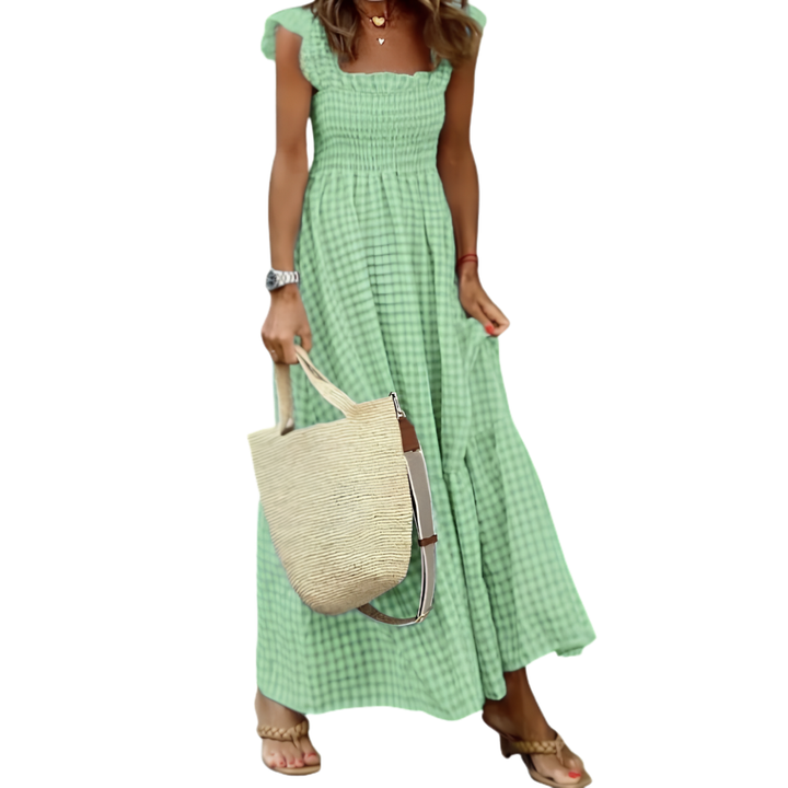 Casual women's smocked tiered maxi dress. Comfortable long dress with practical pockets, ideal for everyday.