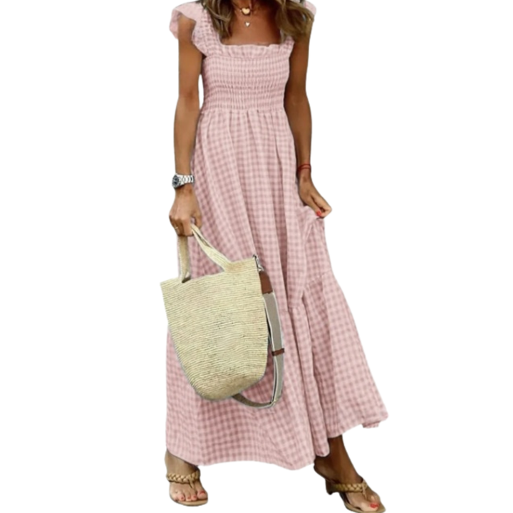 Beautiful smocked tiered maxi dress for women. An elegant and flowy summer dress, perfect for any occasion.